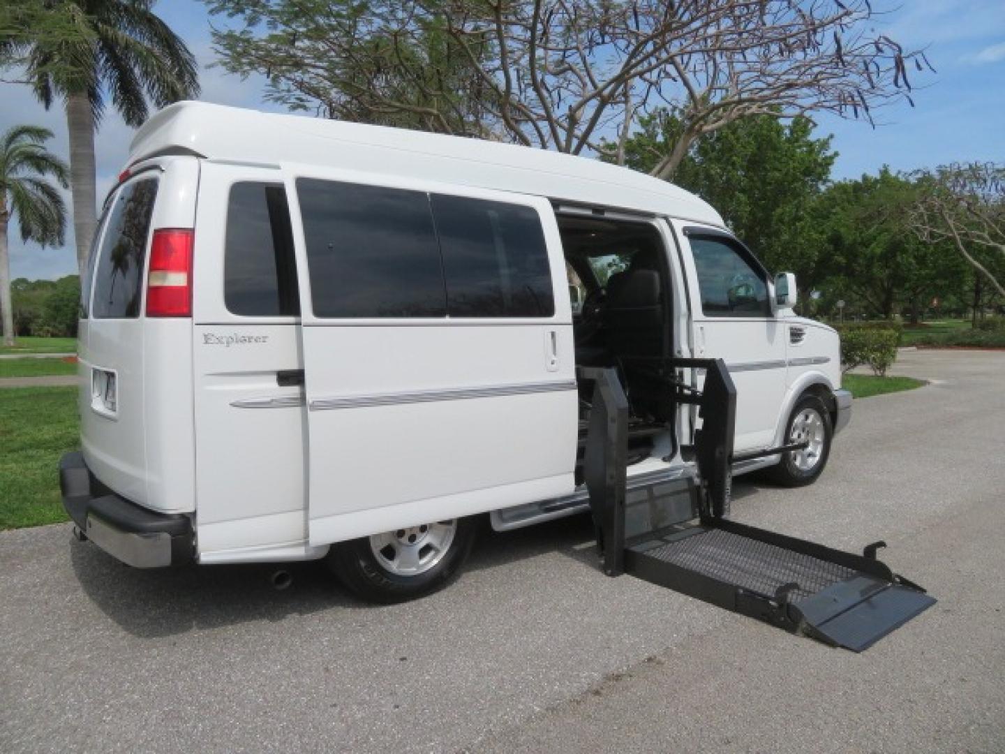 2010 White /Gray Chevrolet Express (1GNUGCD48A1) , located at 4301 Oak Circle #19, Boca Raton, FL, 33431, (954) 561-2499, 26.388861, -80.084038 - You are looking at a Gorgeous 2010 Chevy Express Handicap Wheelchair Conversion Van Explorer Limited SE with 31K Original Miles, Braun Century 750lb Side Entry Wheelchair lift, Tie Down System in the Floor, Rear Entertainment with Flat Screen TV/DVD, Leather Interior, Rear Power Folding Bench Seat/b - Photo#45